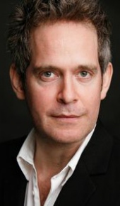 herec Tom Hollander